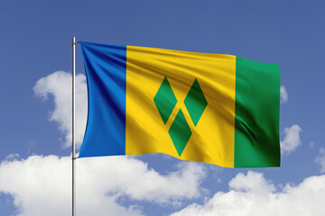 Saint Vincent and The Grenadines flag fluttering in the wind on sky.