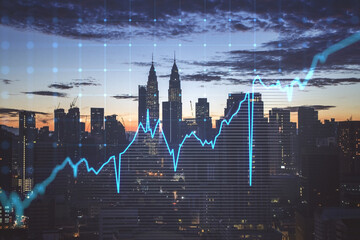Forex graph on city view with skyscrapers background, double exposure. Real estate concept