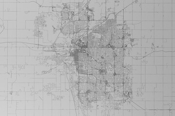 Fototapeta na wymiar Map of the streets of Lincoln (Nebraska, USA) made with black lines on grey paper. Top view. 3d render, illustration