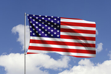America flag fluttering in the wind on sky.