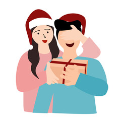 A woman is giving a surprise Christmas gift to her partner, closing her eyes. they wear Santa Claus hats