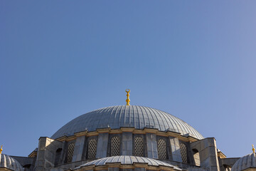 Dome of Suleymaniye Mosque isolated on blue sky. Ramadan or islamic concept