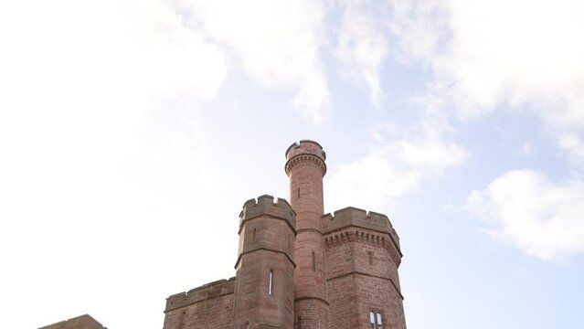 old brick fortress of inverness castle on a hill above the city in Inverness, Scotland in the Highlands