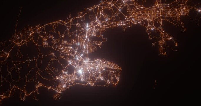 Dalian (China) aerial view at night. Top view on modern city with street lights. Camera is zooming out, rotating clockwise