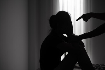 Young depressed woman, domestic and rape violence,beaten and raped sitting in the corner, Domestic violence. Copy space. - obrazy, fototapety, plakaty