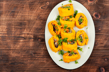 Pumpkin rolls with mushrooms