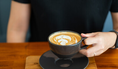 hot latte art coffee on table, relax time
