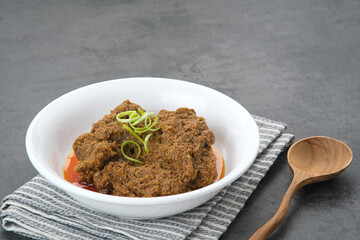 Rendang Daging Sapi, traditional food from Padang, Indonesia. Beef stew with spices, herbs and coconut milk
