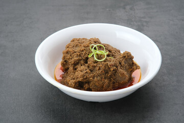 Rendang Daging Sapi, traditional food from Padang, Indonesia. Beef stew with spices, herbs and coconut milk
