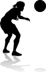 A female soccer football player woman in silhouettes