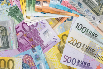 Lot of paper euro cash as finance background, top view