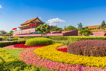 Colorful flowers in front of the entrance to the Forbidden City in Beijing, China