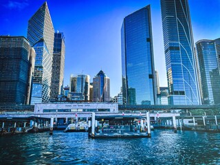 Circular Quay Railway Station by Ferry and City Buildings