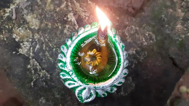 A lamp is a light that works by using electricity or by burning oil or gas also known as dipak in hindi