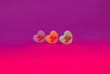 Fototapeta na wymiar Trio of Valentine's Day Candy Hearts