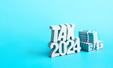 Tax 2024 with money bank note.business revenue and cost expenses.investment and saving money...