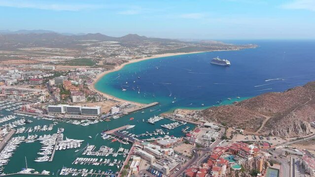 Mexico, Cabo San Lucas: Aerial view of famous resort city on southern tip of Baja California peninsula, Medano Beach (Playa El Medano) - landscape panorama of Latin America from above