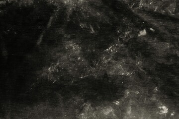 Dirty fabric background or rough skin grunge texture gray-black tone.