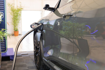 An Eco-Friendly Vehicle Charging Up at a Modern Charging Station