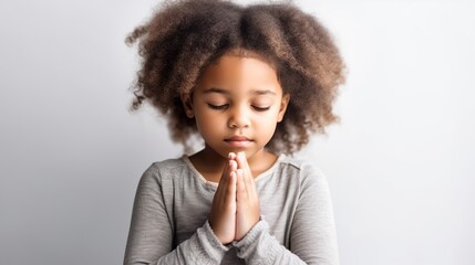 Fototapeta na wymiar Hopeful Child Praying: Emotional Image on whiteBackground