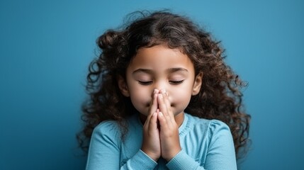Child's Innocent Prayer: Little Girl with Hands Folded

