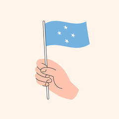 Cartoon Hand Holding Micronesian Flag, Simple Vector Design. Flag of Micronesia, Oceania, Isolated Flat Illustration