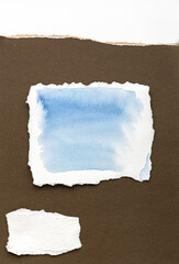 Paper different shapes scraps isolated on brown background White Ripped Piece of Paper isolated....