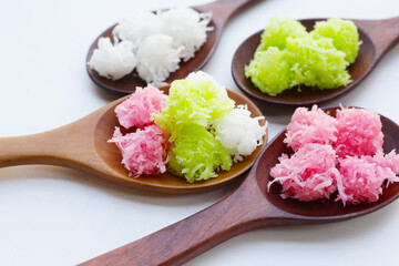 Sweet coconut balls, crispy coconut candies (Maprao Gaew). Thai traditional dessert