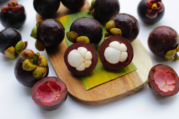 Fresh mangosteen fruit on white background.