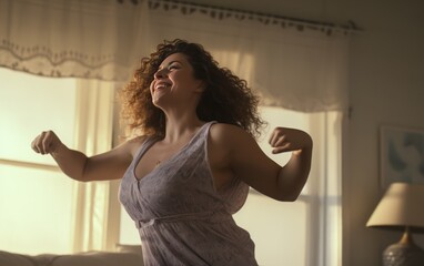 Portrait of a plump 35-year-old middle-aged woman dancing happily in the bedroom 