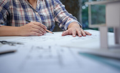 Architecture drawing on architectural Creative project business architecture building construction Industrial engineering Achievement Planning Design on blueprint eco