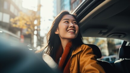 Young beautiful asian women getting new car. she very happy and excited looking outside  - obrazy, fototapety, plakaty