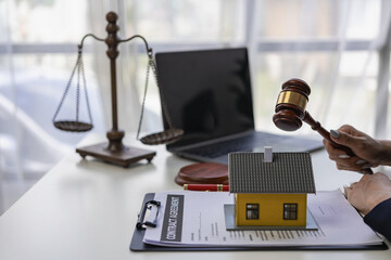 Home Referee Judgment concept with hammer and front view of house. House concepts, law, and...