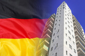 Modern residential building on background of flag Germany. New apartment building on background of...