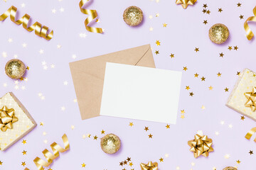 Holiday festive greeting card template. Blank craft paper mockup with gold confetti, party decoration on pastel lavender background. Flat lay, top view, copy space. New year, happy birthday concept.
