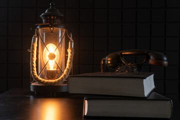 Vintage lamp and telephone. A study with rarities. A cozy atmospheric photo that transports us to...