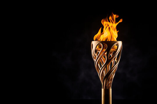 Olympic flame, the torch with a bright, dynamic flame against a dark backdrop, that travels across continents to herald the commencement of the games.