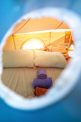 Tent with an inflatable mattress inside. Place for two.