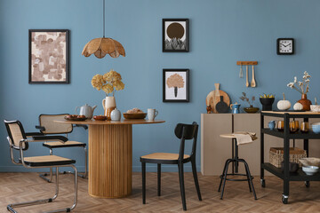 Interior design of warm dinning room interior with mock up poster frame, round table, rattan...