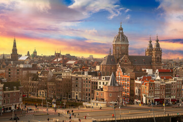 Amsterdam, Netherlands town cityscape over the Old Centre District with Basilica of Saint Nicholas - obrazy, fototapety, plakaty