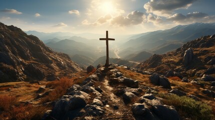 A Christian cross on top of a mountain with a shinin