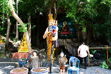 Ancient hermit or antique eremite statues for thai people travelers respect praying blessing myth...