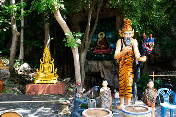Ancient hermit or antique eremite statues at Cavern for thai people travelers respect praying...