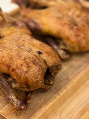 Close-up of duck meat on cutting board
