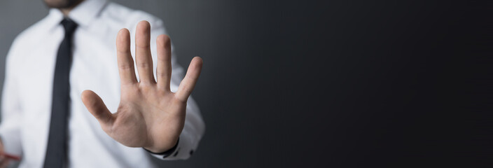 Business man making stop sign