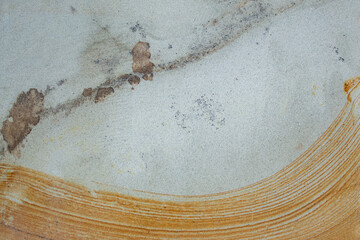 Sand stone with rusty veins like marble texture, close up