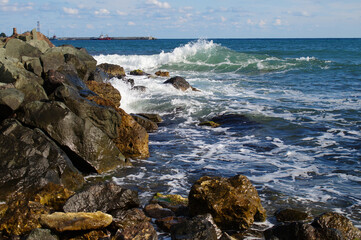 Waves crash on a rocky shore