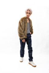 Fototapeta premium winter faux fur coat. Fashion portrait Asian young man. model, clothing and cosmetics. Young male model fashion lifestyle in fashionable clothing on isolated white background