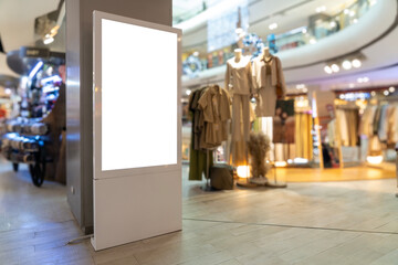 Vertical blank LED TV Screen stand in shopping mall.