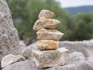 Stacked stones on an old stone wall - obrazy, fototapety, plakaty